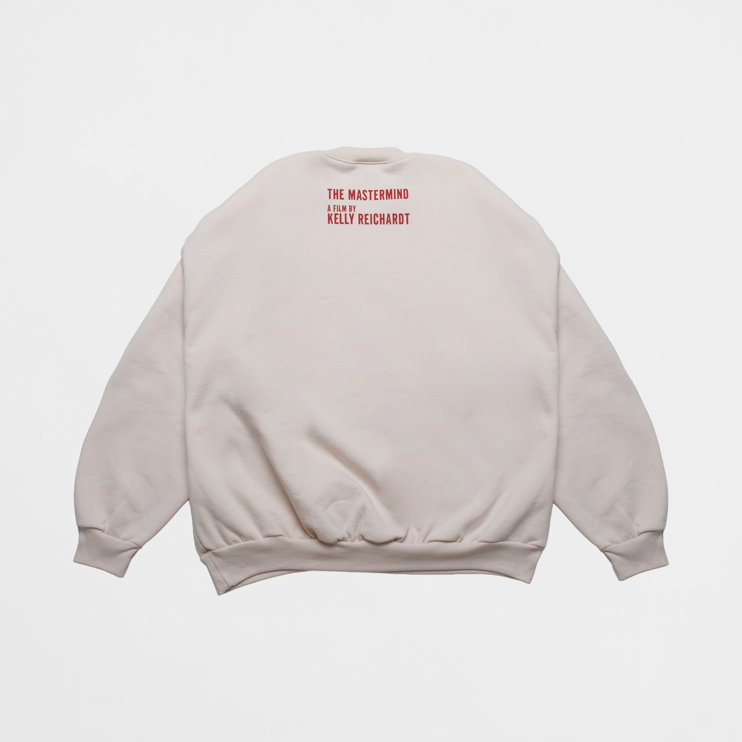 THE MASTERMIND sweatshirt with "THE MASTERMIND A FILM BY KELLY REICHARDT" on the back