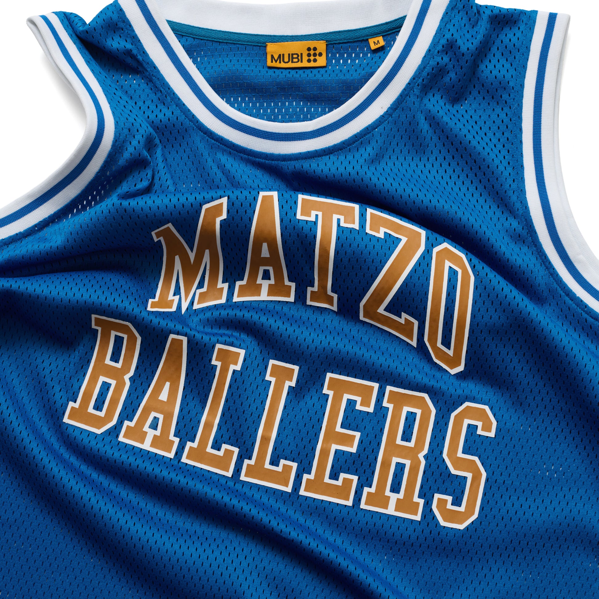Blue sports jersey with 'MATZO BALLERS' printed and MUBI logo